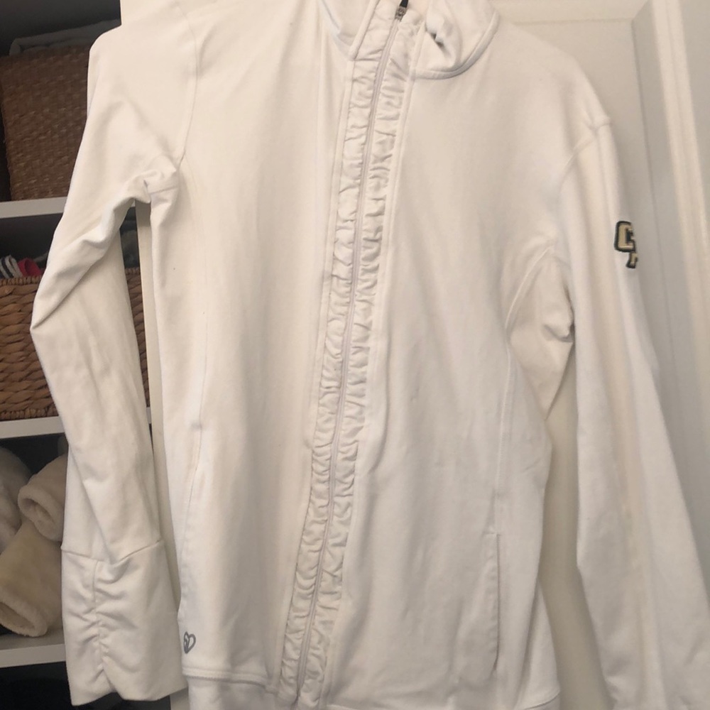 White zip up workout jacket with Cal Poly logo
